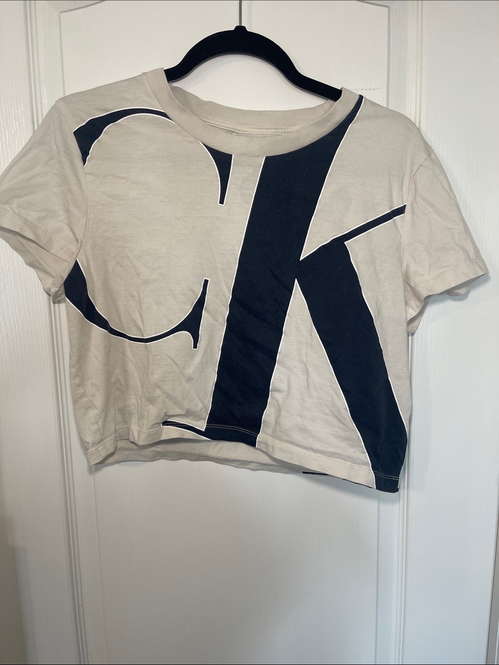 Calvin Klein Cream Crop Tee with Large Black CK Print